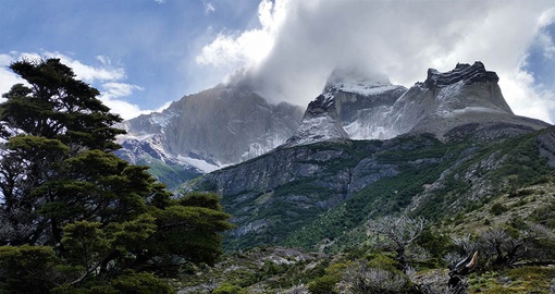 Taking the amazing views in Torres Del Paine  is the perfect expereince on your Chile Tour