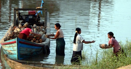 Log carriers working on the river