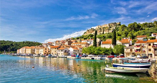 The clear blue waters of Croatia's Dalmatian Coast are renown for stunning sunsets and medieval architecture
