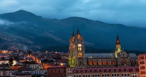 Night time view of the Basilica and old town in Quito
