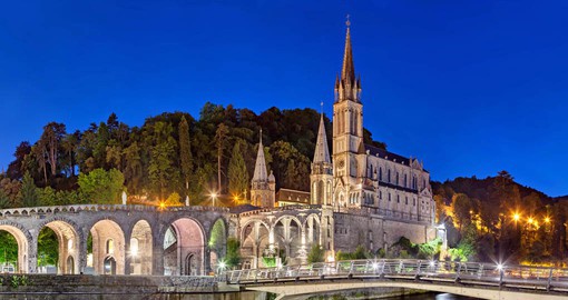 Lying in the foothills of the Pyrenees, Lourdes became famous of the 1858 apparition of the Virgin Mary