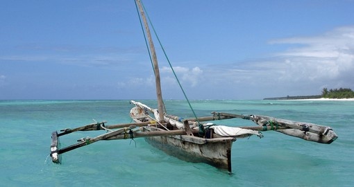 Old wooden arabian dhow in the Indian Ocean near Zanzibar