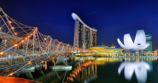 Enjoy the lights and unique architecture around the main waterfront strip in Singapore on your Singapore Vacation