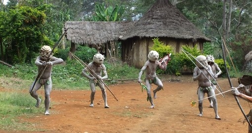 Mudmen warriors dancing