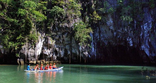 Sail into a Cave on the St. Paul's Underground River, one of the 7 new wonders of nature on your Philippines Vacation.