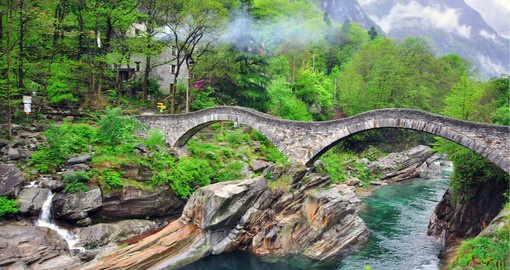 Completed 400 years ago the "Ponte dei Salti" stone bridge soars over the turquoise Verzasca