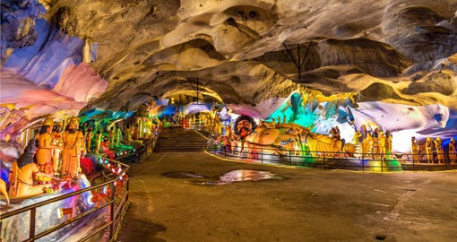 Walk through the ancient Batu Cave system which is decorated with magnificent artwork and statues on one of your Malaysia Tours
