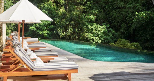 Include some relaxing time by the Four Seasons Sayan's Pool on your Bali Vacation package