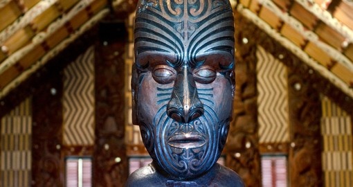 Maori meeting house near the treaty house in Waitangi is a great photo opportunity on your New Zealand vacation.