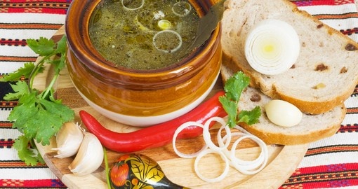 Russian tradition soup with bread and garlic