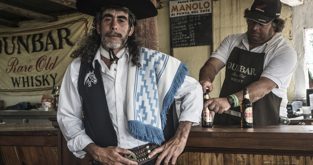 Man serving at a bar in Punta del Este, Uruguay